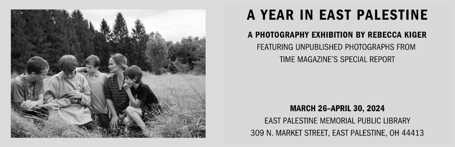 Year in East Palestine Exhibition with photo of  a woman and four boys sitting in a field